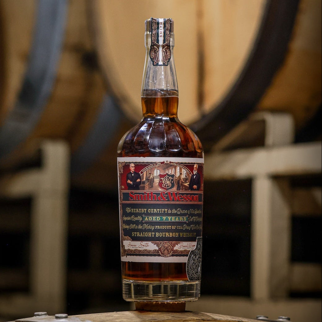 Smith & Wesson™ Classic Collection on whiskey barrel